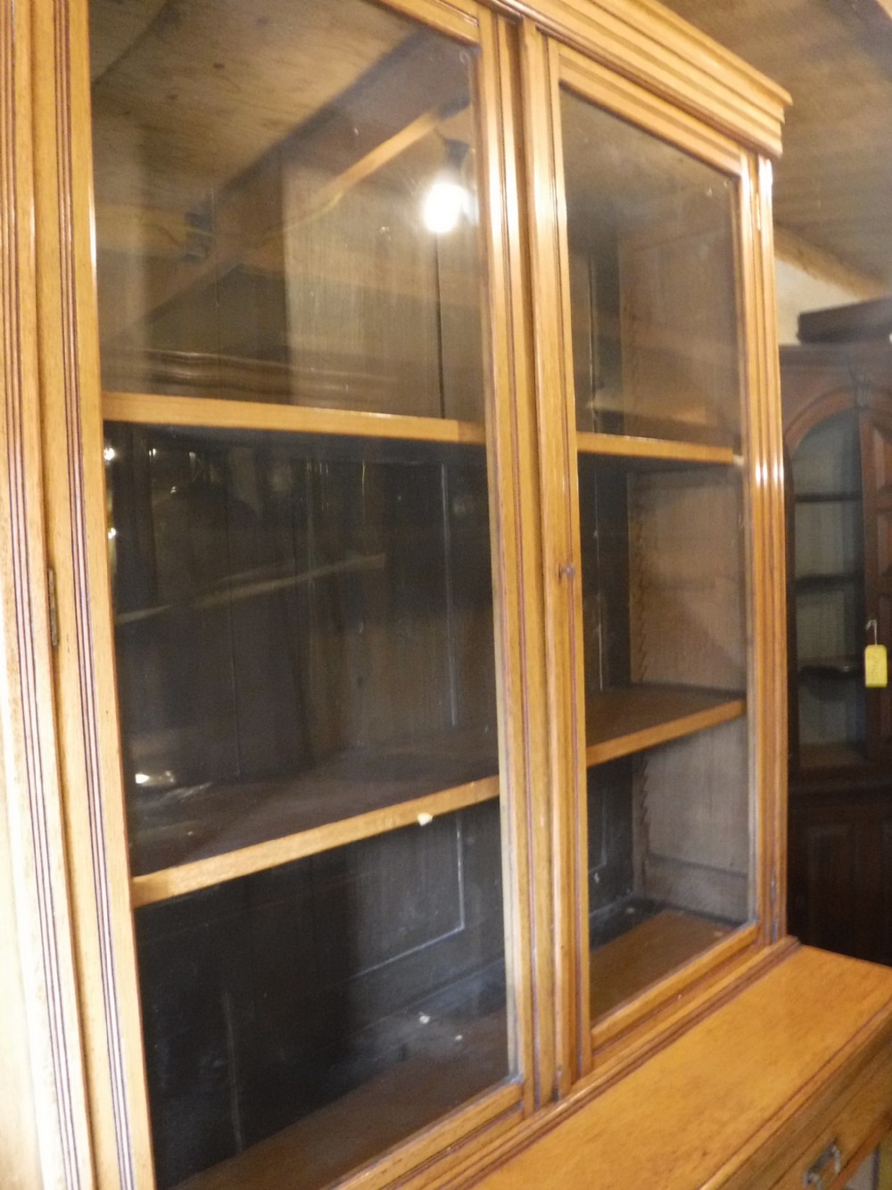 Good clean and practical Late Victorian  light oak bookcase cabinet View V