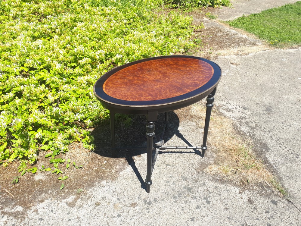 Victorian ebonised and amboyna centre table View II
