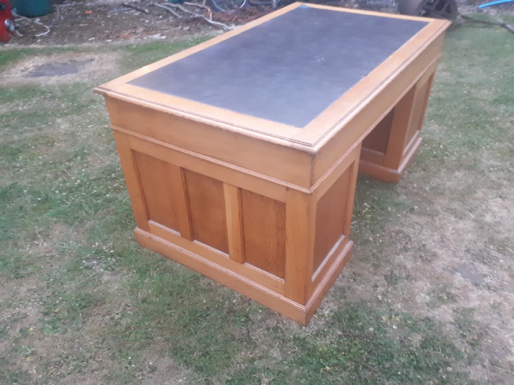 Large early 20th century panelled oak desk View V