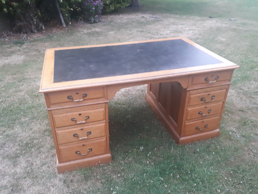Large early 20th century panelled oak desk View VI