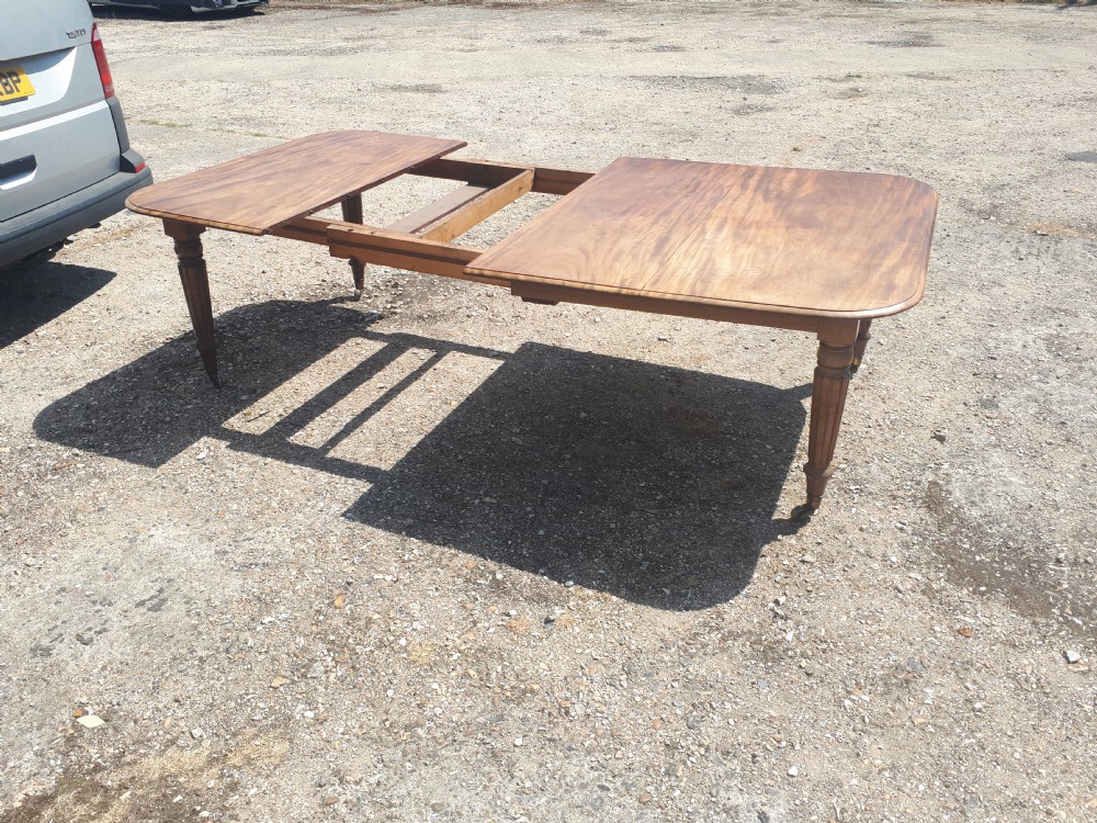 Regency mahogany extending dining table