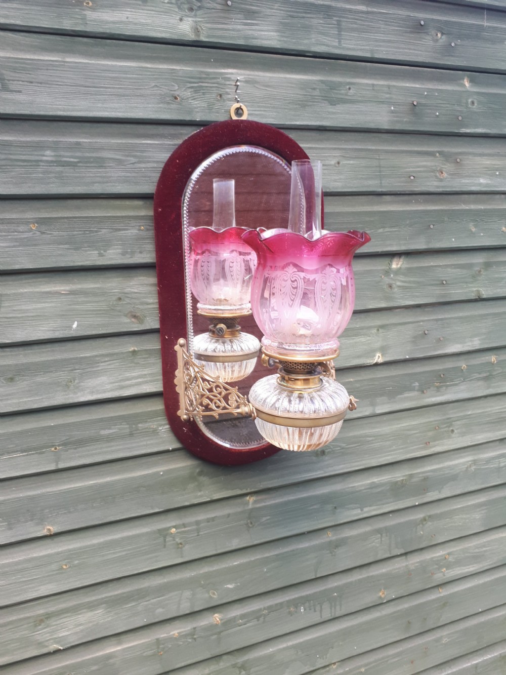 Late 19th century wall mounted mirrored oil lamp View II