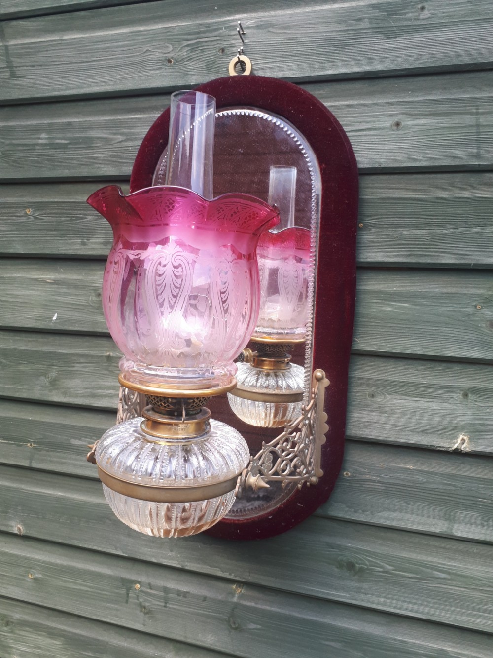 Late 19th century wall mounted mirrored oil lamp View III
