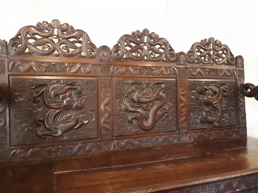 Oriental carved hall seat. View VII