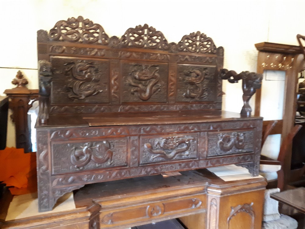 Oriental carved hall seat. View VIII