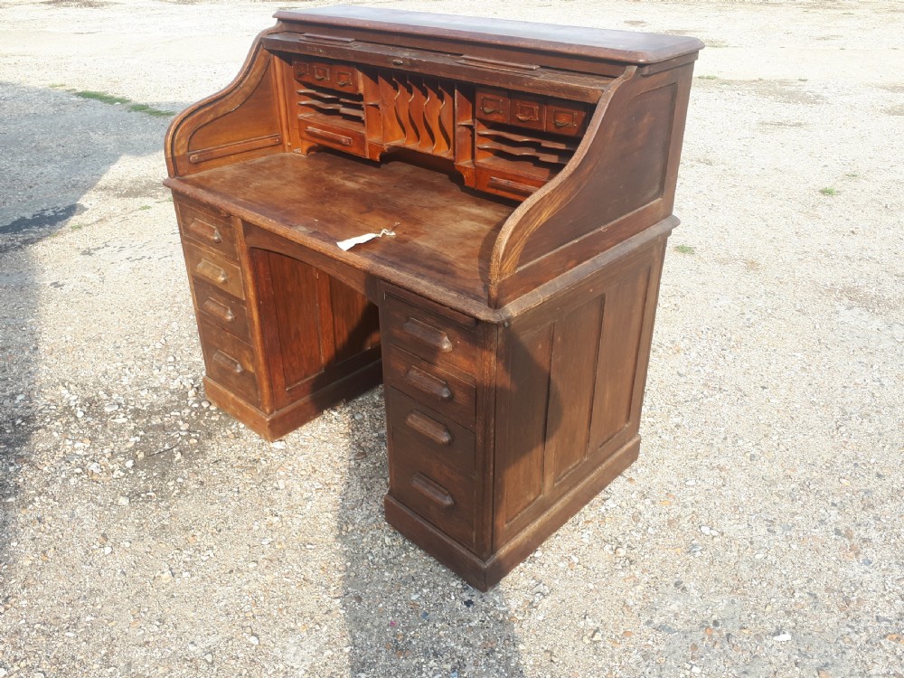 Early 20th century oak roll top pedestal desk View II