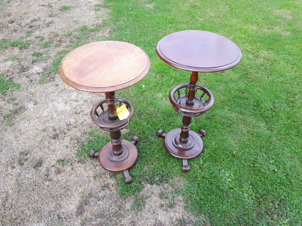 A very close matched pair of decanter tables