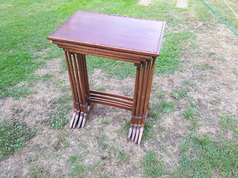 Nest of 4 Edwardian mahogany occasional tables View II