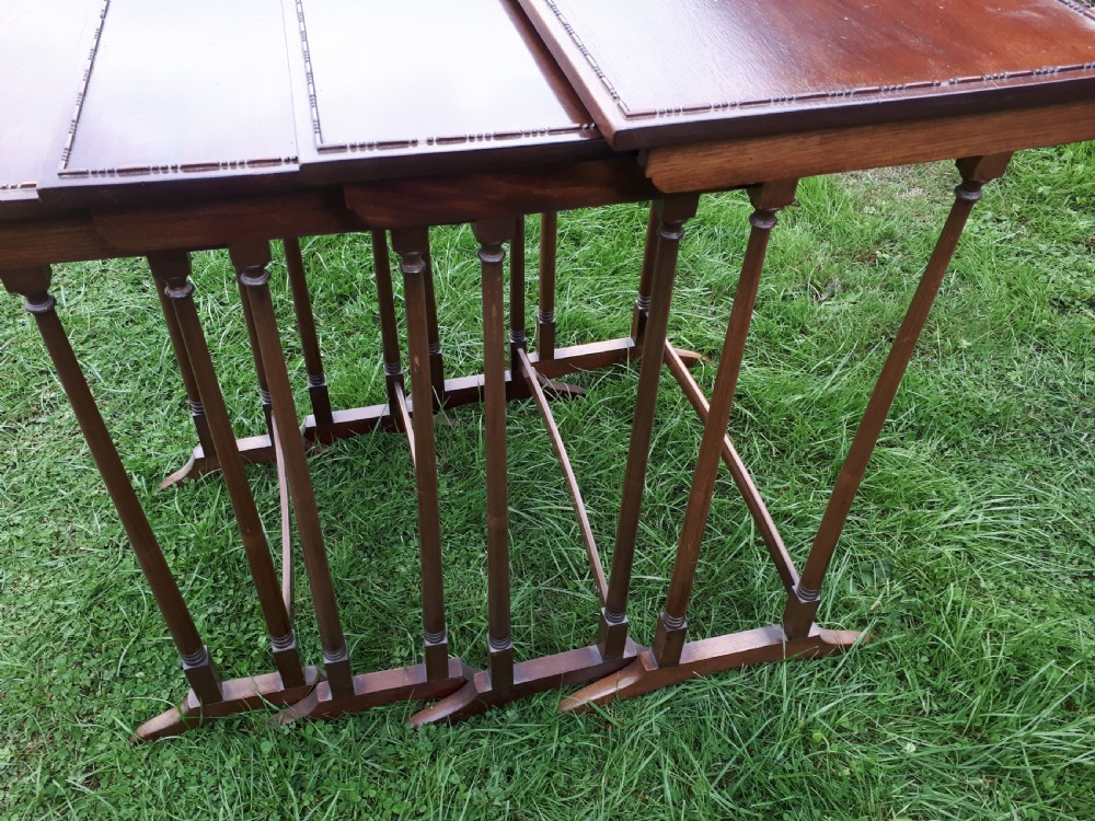 Nest of 4 Edwardian mahogany occasional tables View III
