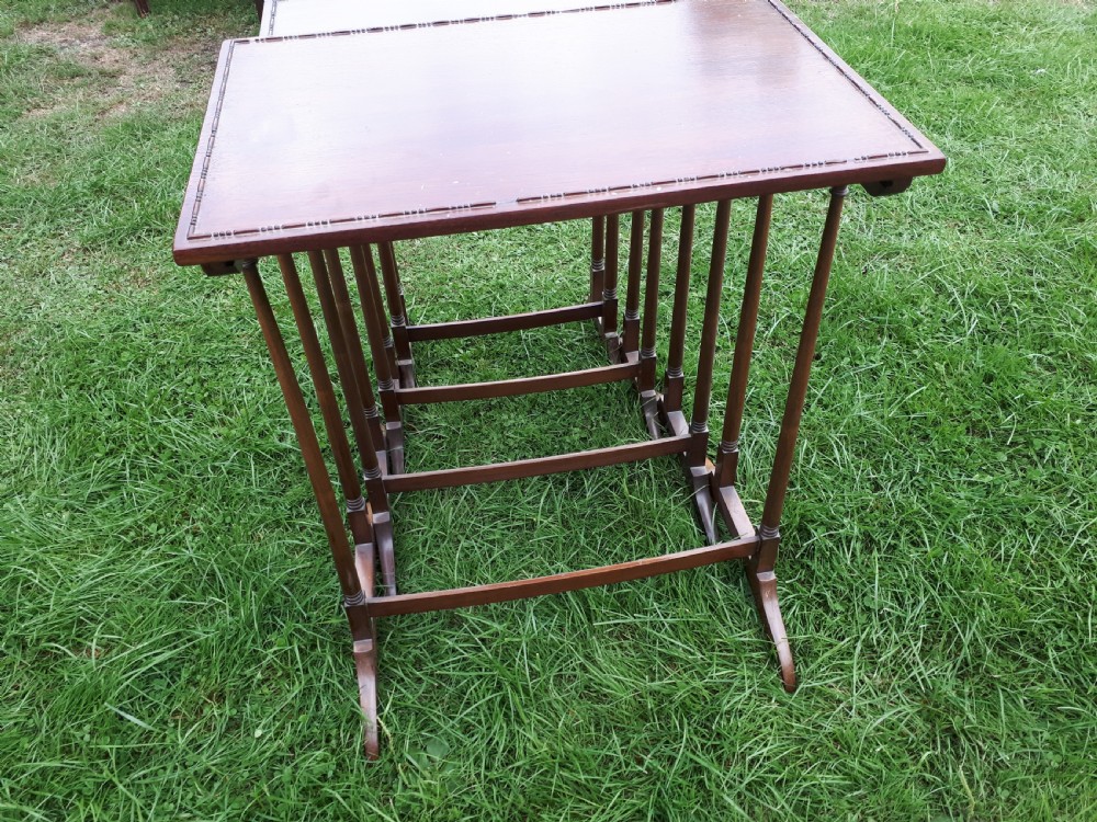 Nest of 4 Edwardian mahogany occasional tables View V