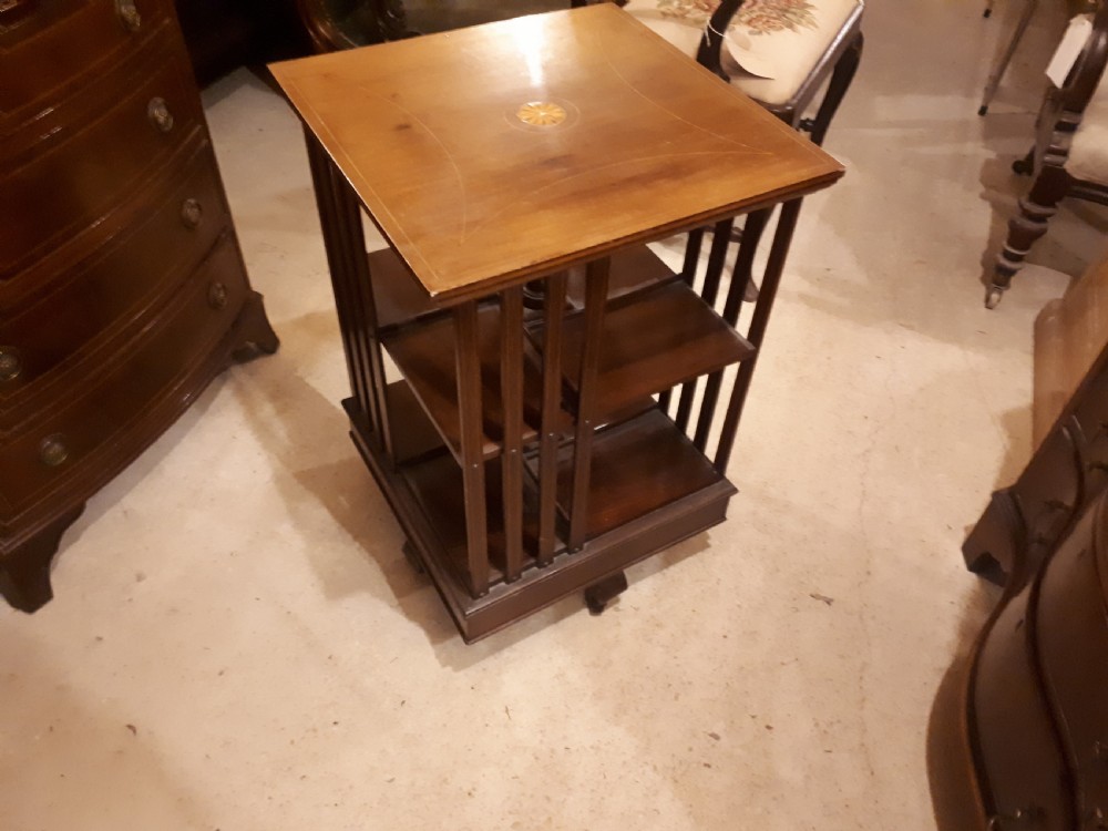 Neat Edwardian inlaid mahogany revolving bookcase  View II
