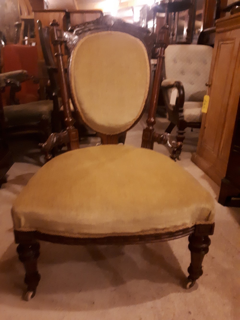 Late 19th century carved walnut nursing chair. View IV
