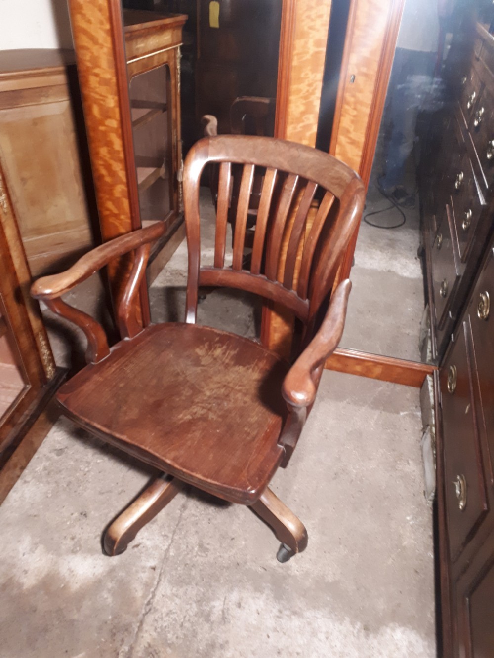 Unusual designed mahogany revolving desk armchair 