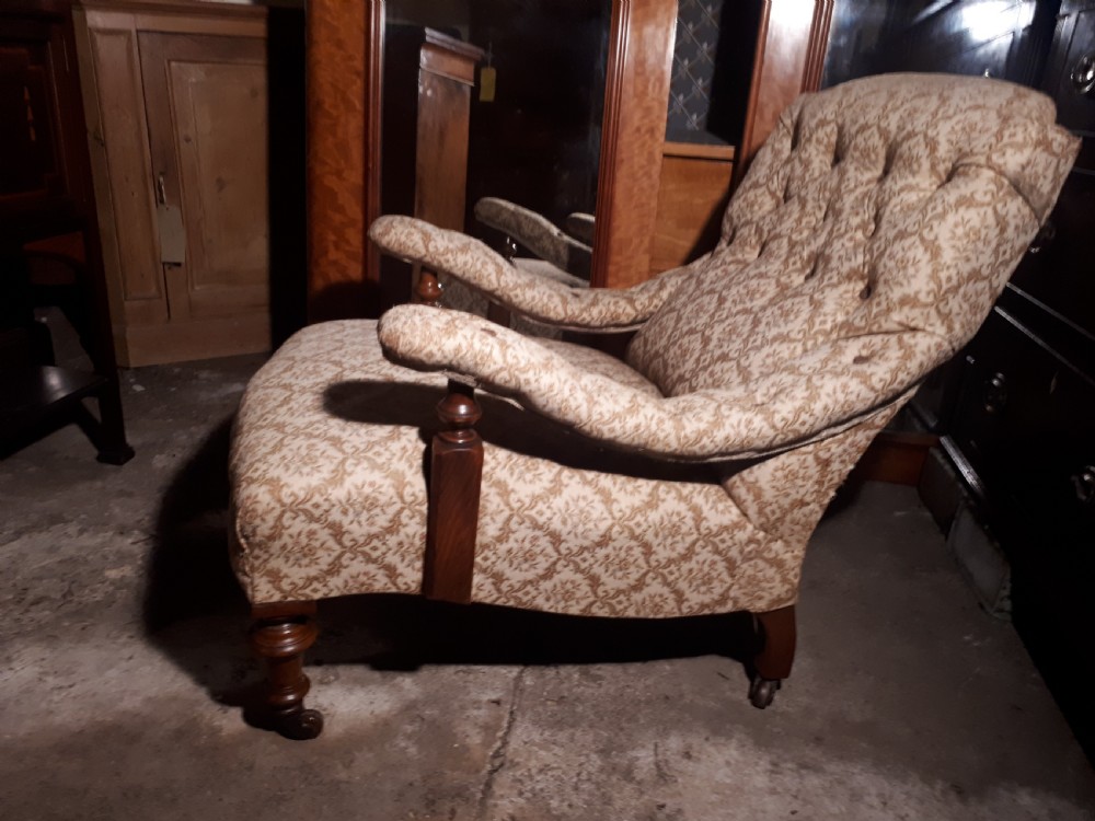 Late 19th century upholstered armchair in the manner of Howard   View II