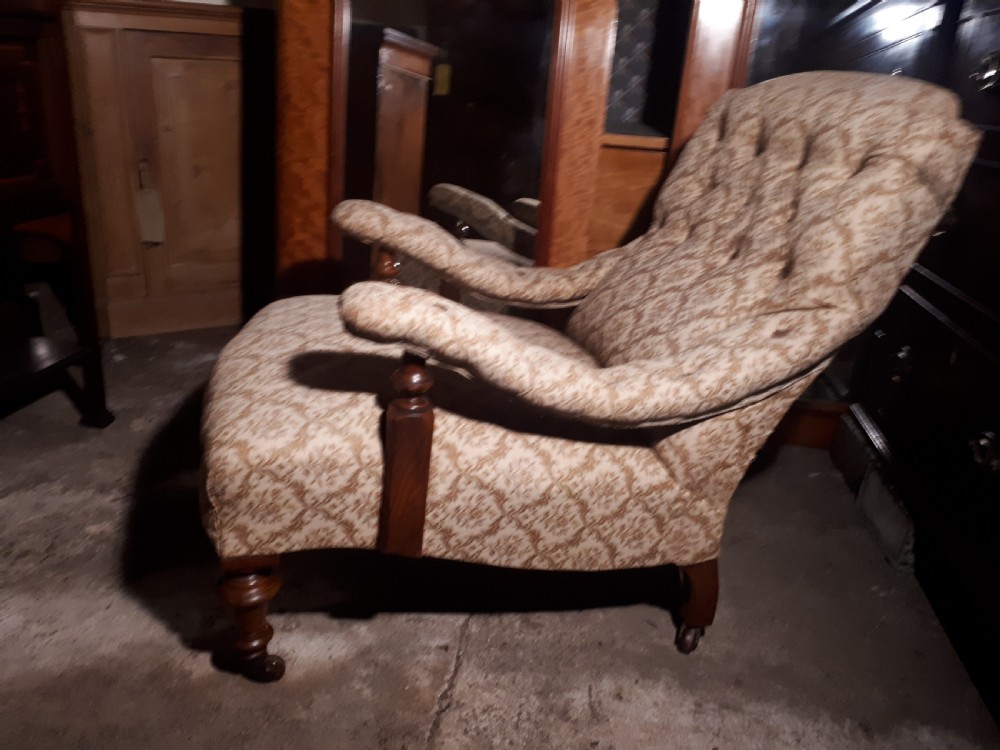 Late 19th century upholstered armchair in the manner of Howard   View III