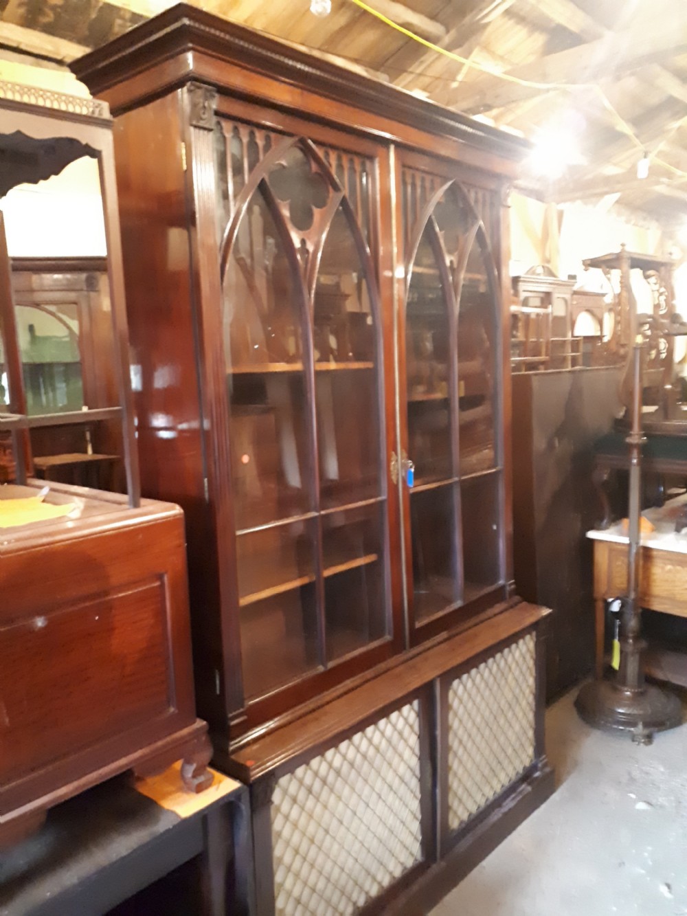 19th century mahogany bookcase cabinet with gothic arched doors View II