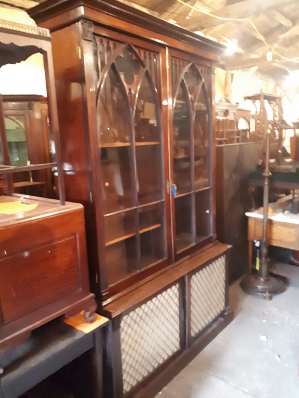 19th century mahogany bookcase cabinet with gothic arched doors View VI