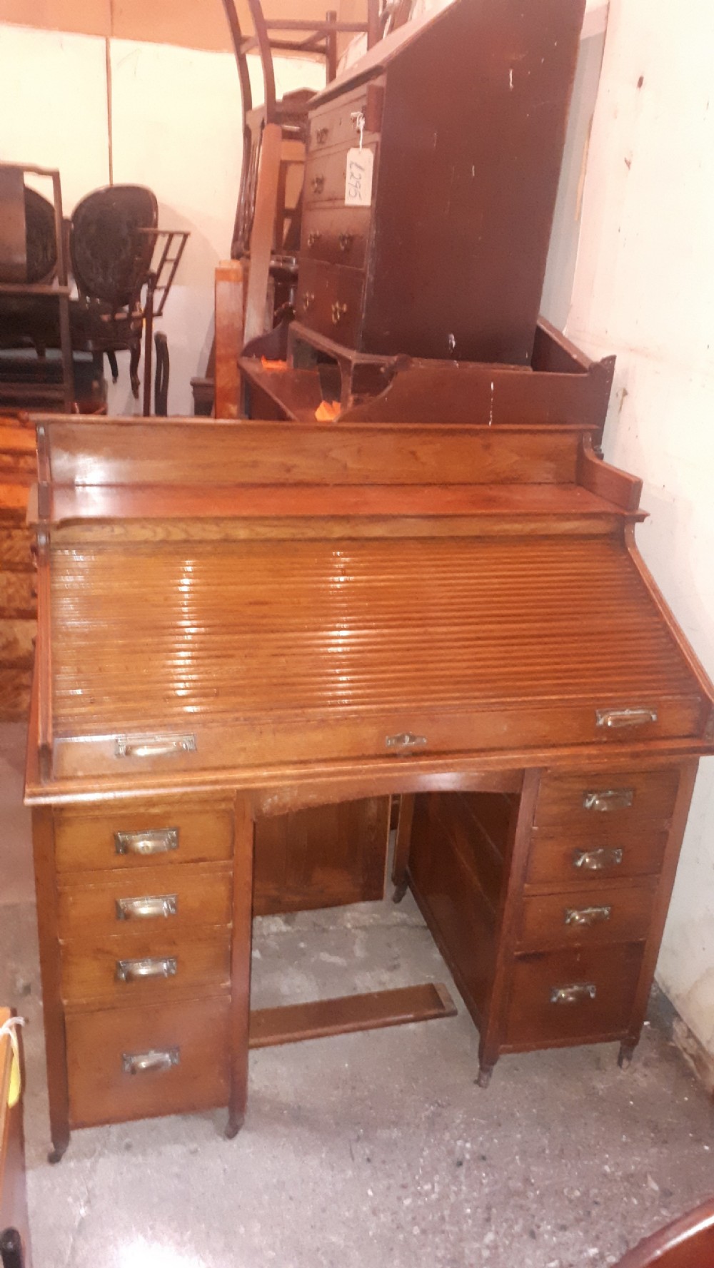 Neat Early 20th century tambour top desk