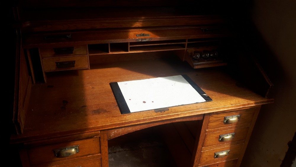 Neat Early 20th century tambour top desk View III