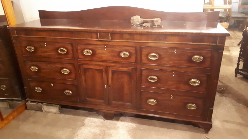 Large early 19th century inlaid mahogany dresser base 