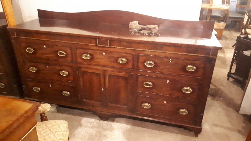 Large early 19th century inlaid mahogany dresser base  View IV