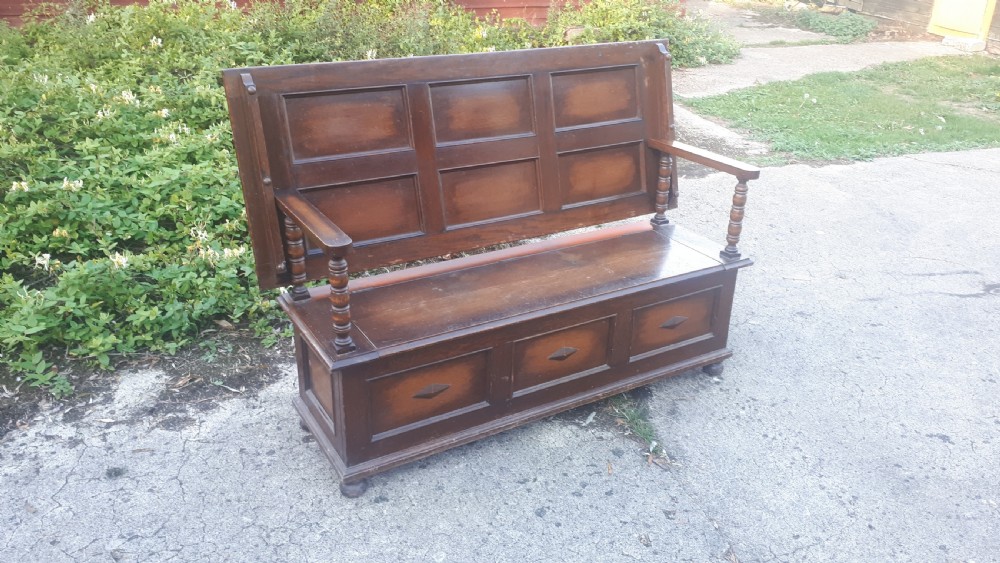 Large early 20th century panelled oak monks hall seat