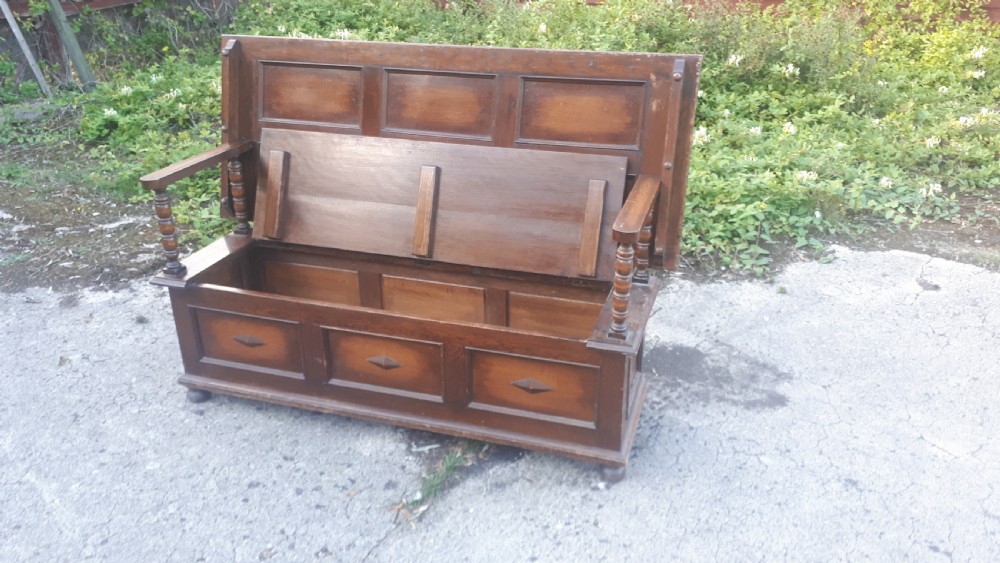 Large early 20th century panelled oak monks hall seat View II