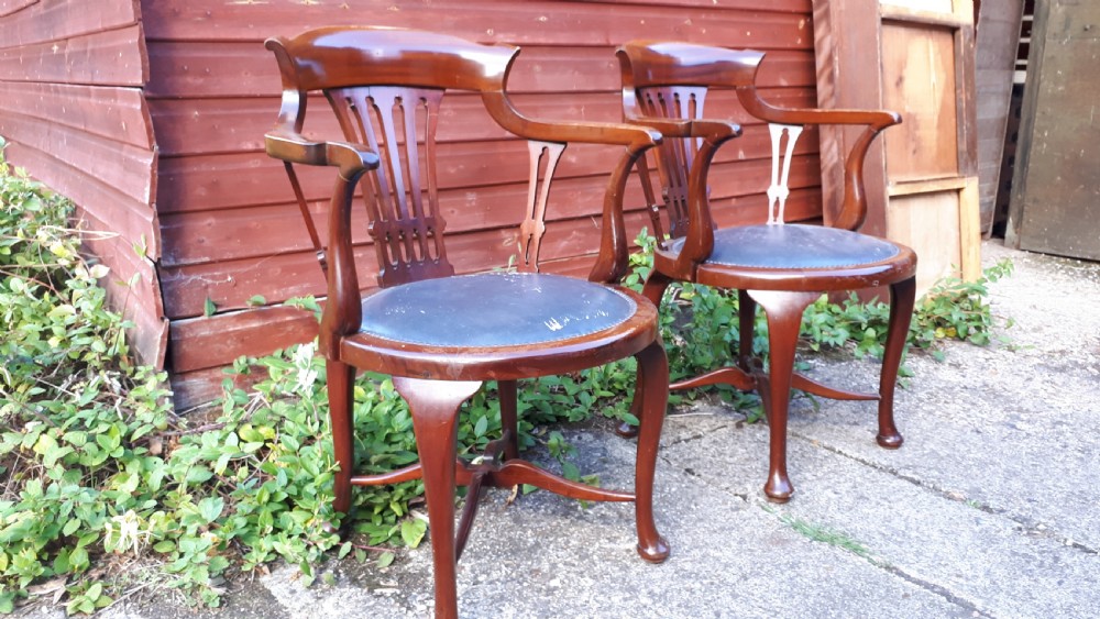 Pair of early 20th century mahogany desk armchairs View II