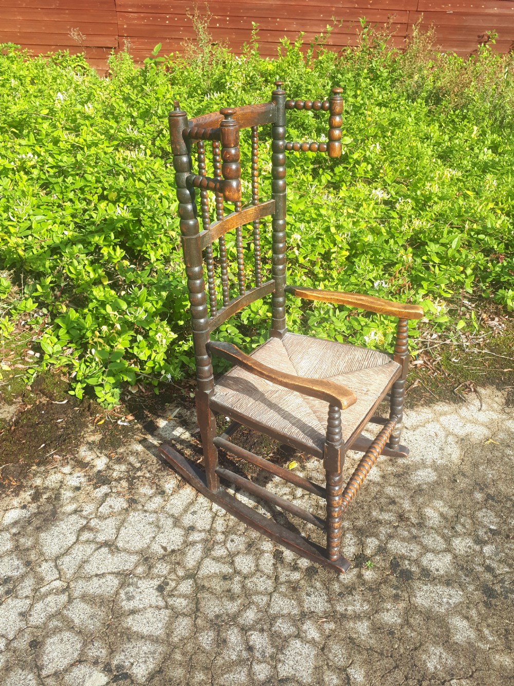 Childs 19th century wool winding rocking chair  View II