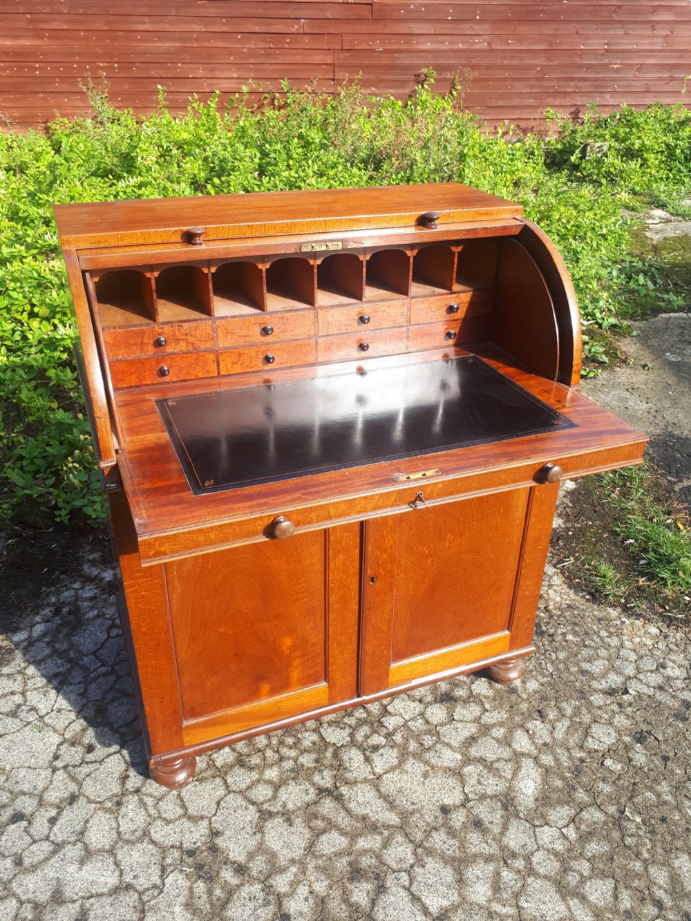 Small and neat Regency cylinder top writing desk View II