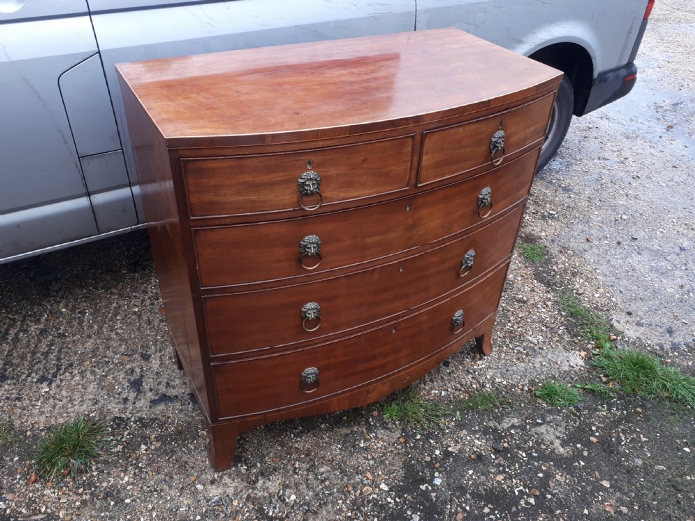 Good practical Regency bow front chest of drawers View III