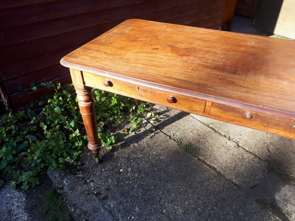 Early Victorian 5 foot mahogany 2 drawer library table. View II