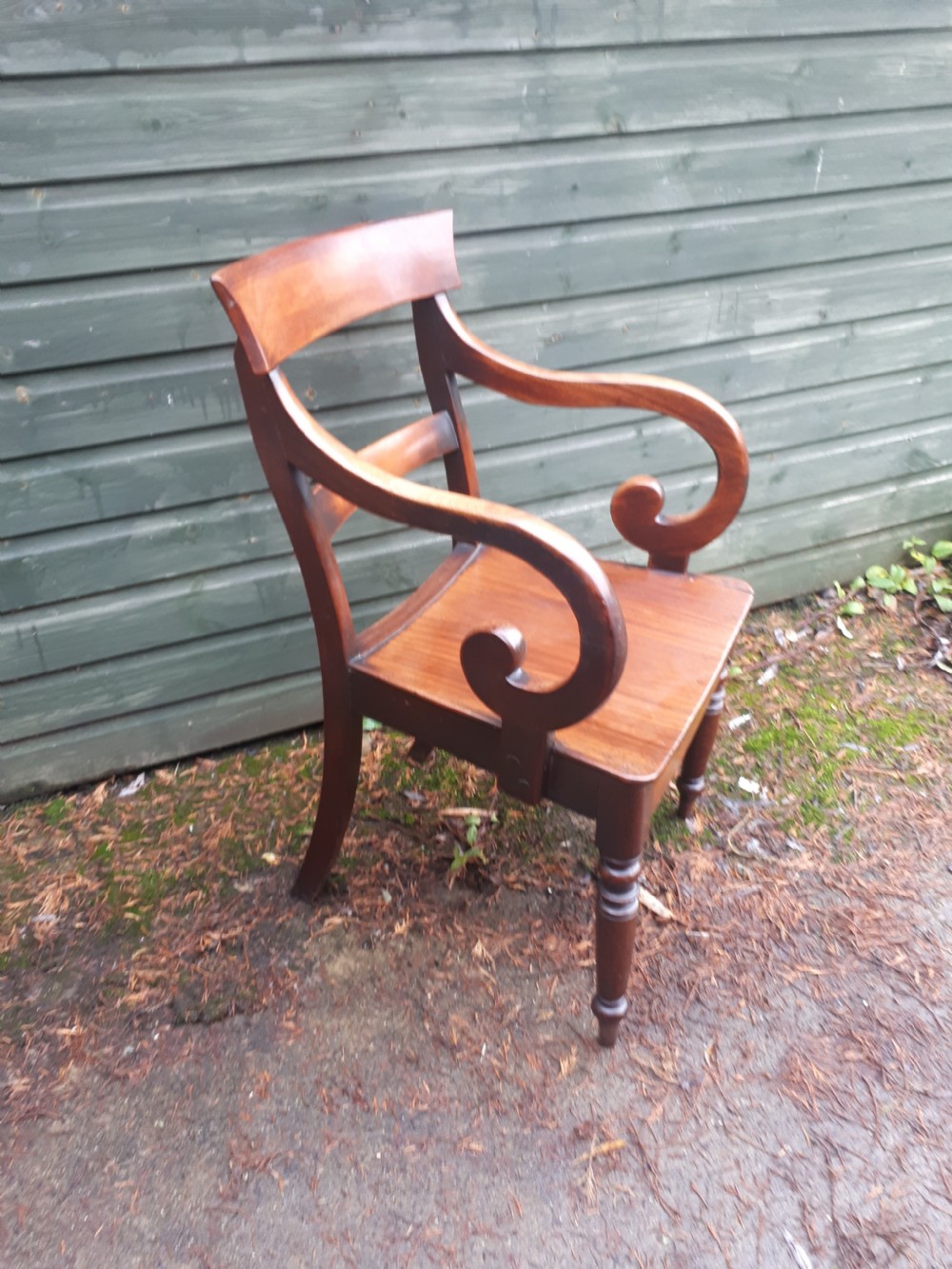 Early Victorian scroll arm desk armchair