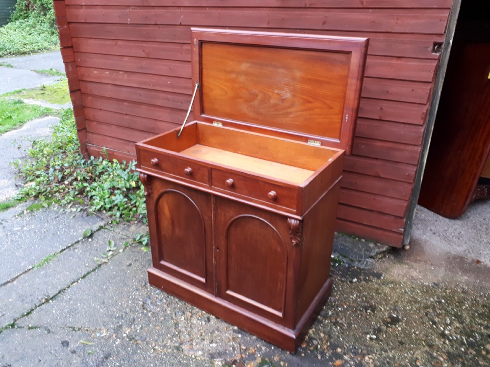 Useful and unusual Victorian cupboard with lift up top 