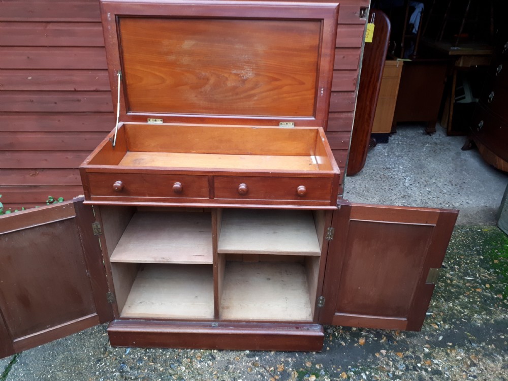 Useful and unusual Victorian cupboard with lift up top  View III