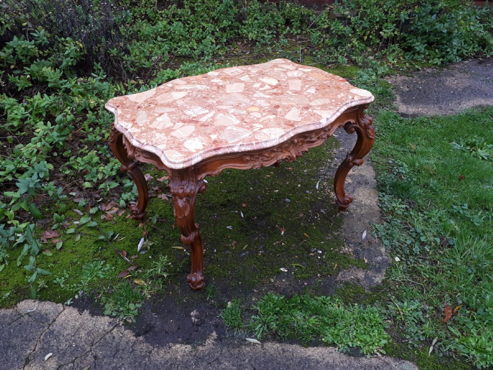 Early 20th century marble top coffee table with carved base View IV