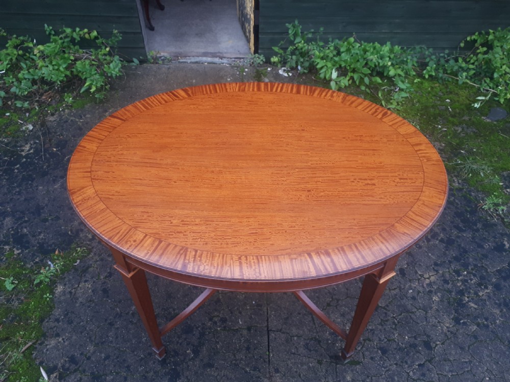 Large Edwardian oval satinwood occasional table  View V