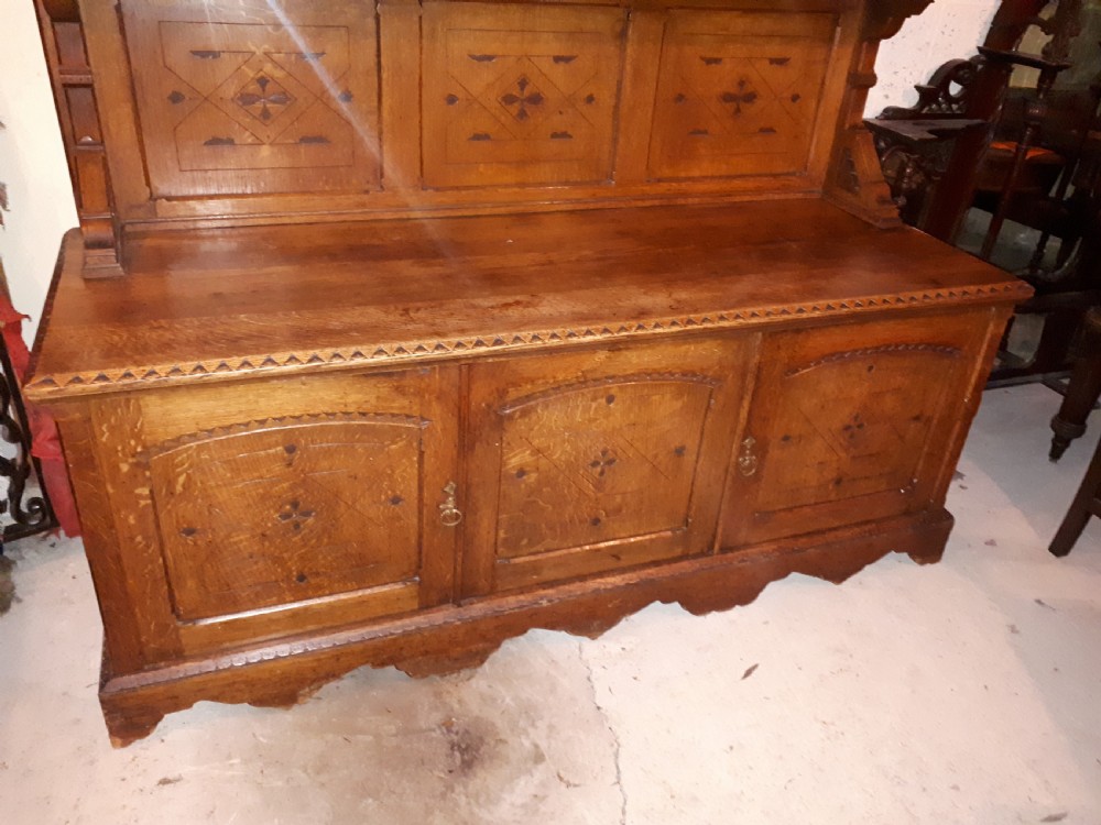 Useful 19th century oak gothic mirror back side cabinet View III