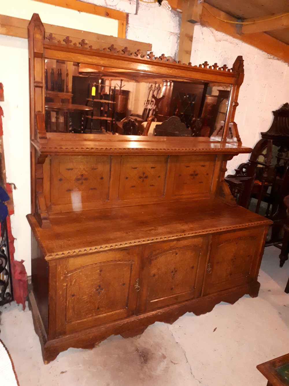 Useful 19th century oak gothic mirror back side cabinet View IX