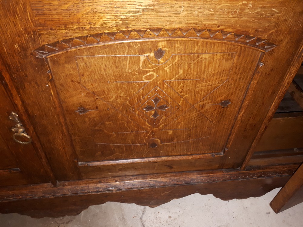 Useful 19th century oak gothic mirror back side cabinet View X