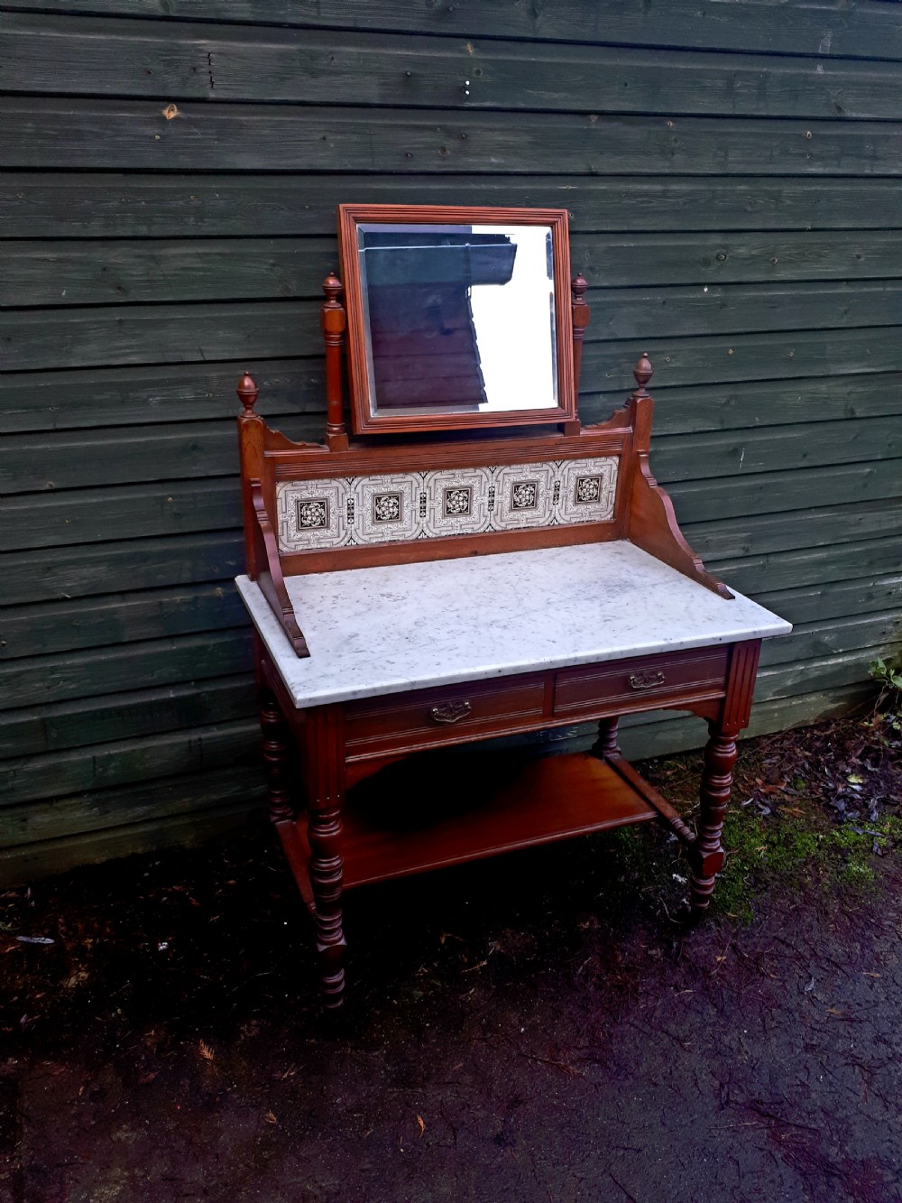 Neat late Victorian marble top hall table.Makers stamp.