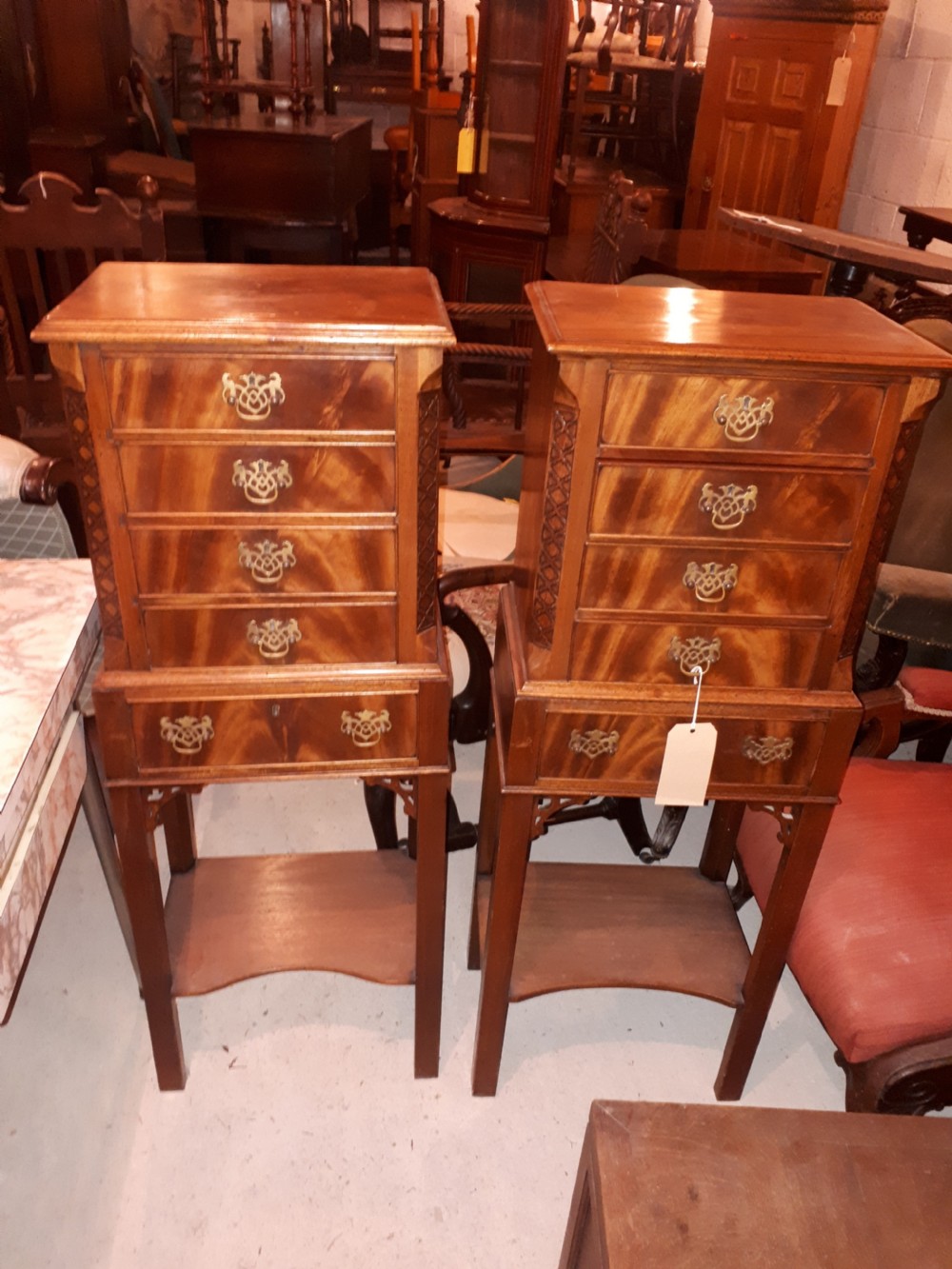 Pair of mahogany chests on stands. View II