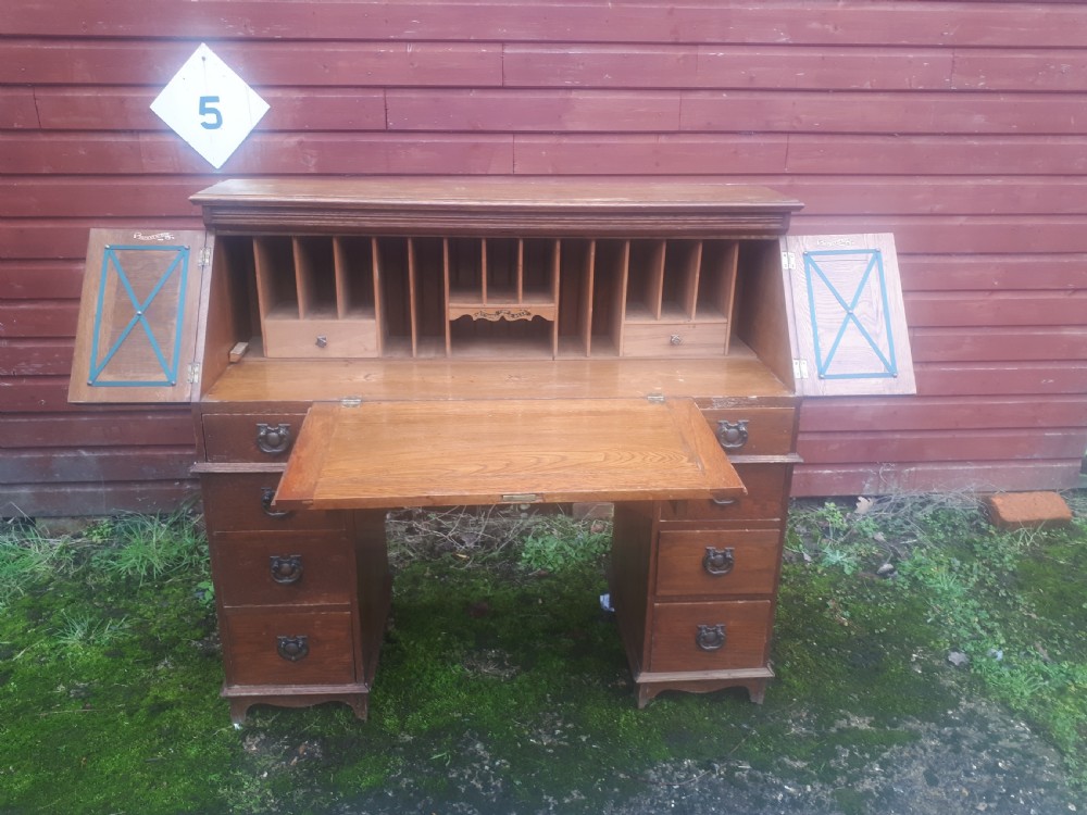 Edwardian  oak writing desk. 