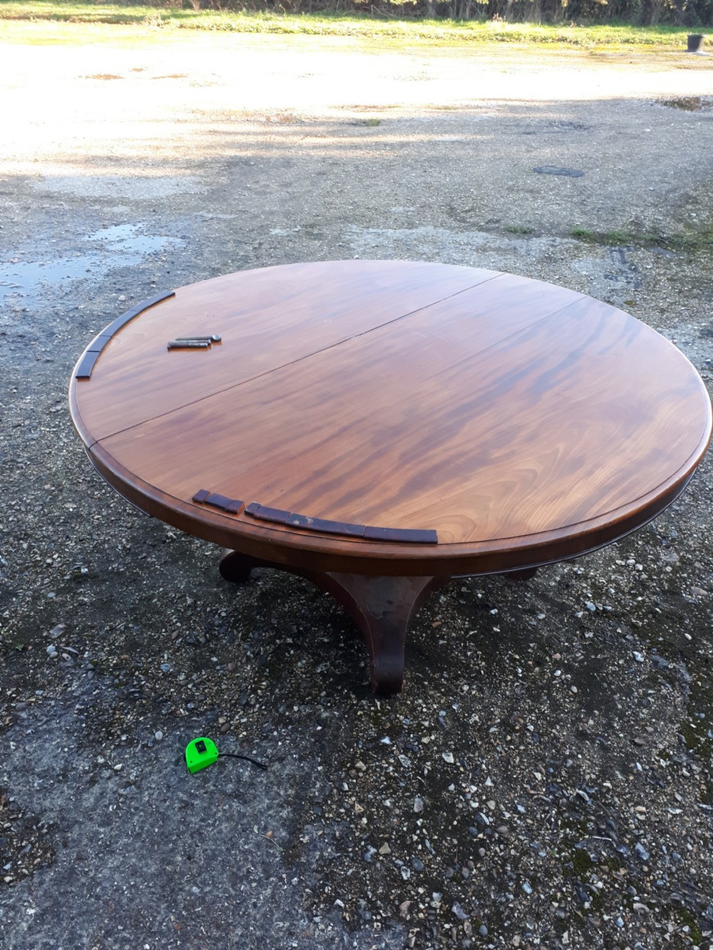 5 foot 8 seater round dining table. View VII