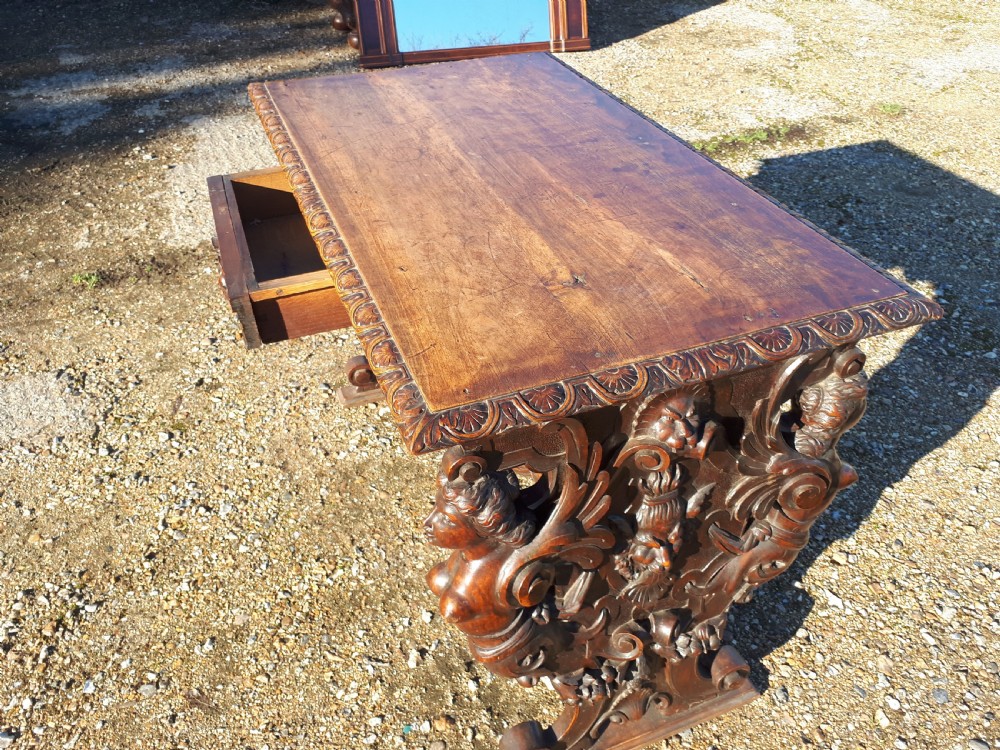 19th century carved walnut side table.