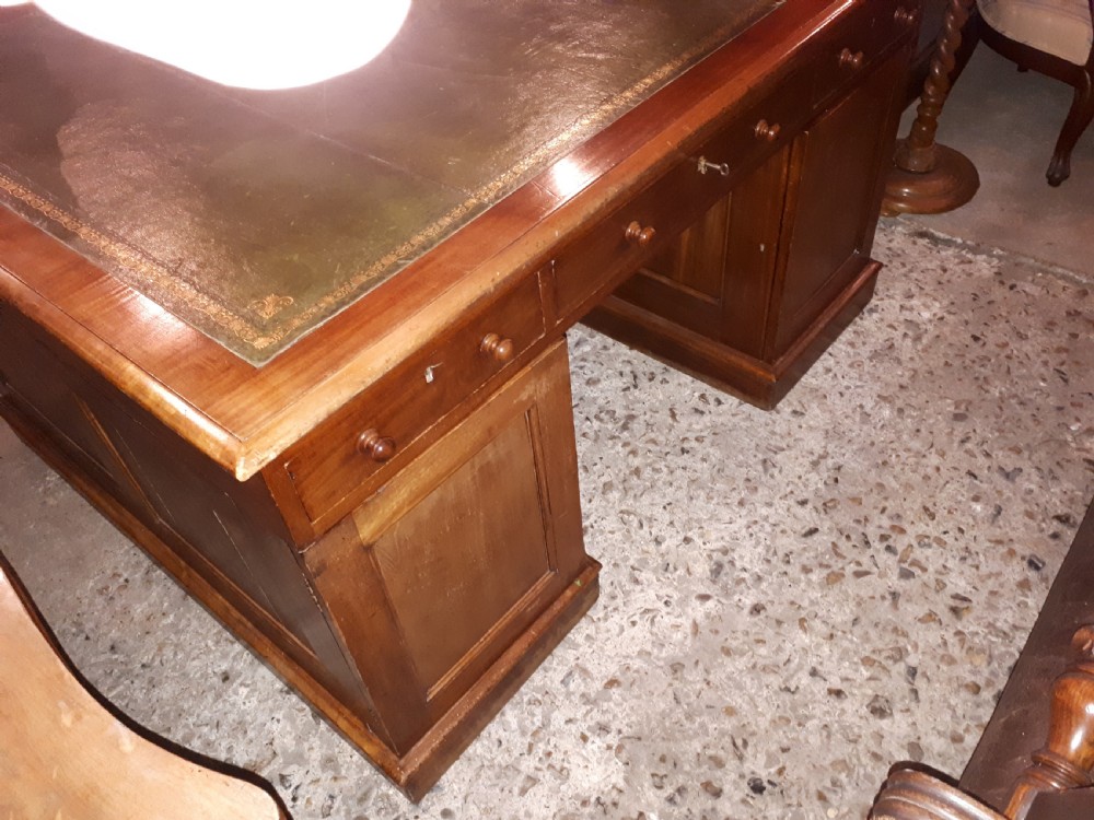 Late Victorian mahogany pedestal partners desk.  View IV