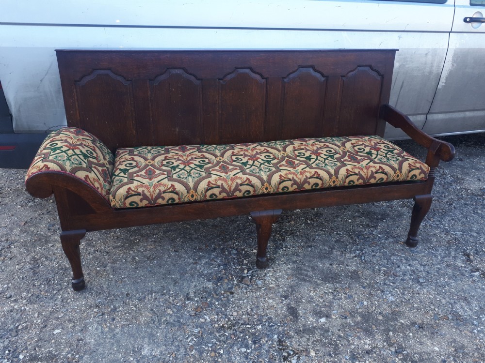 Late Georgian panelled oak night porters hall sleeping bench View II