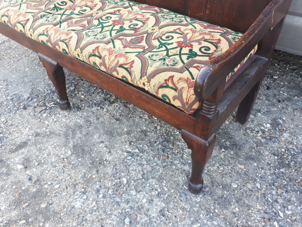 Late Georgian panelled oak night porters hall sleeping bench View V