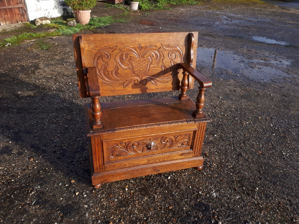 Early 20th century carved oak monks bench
