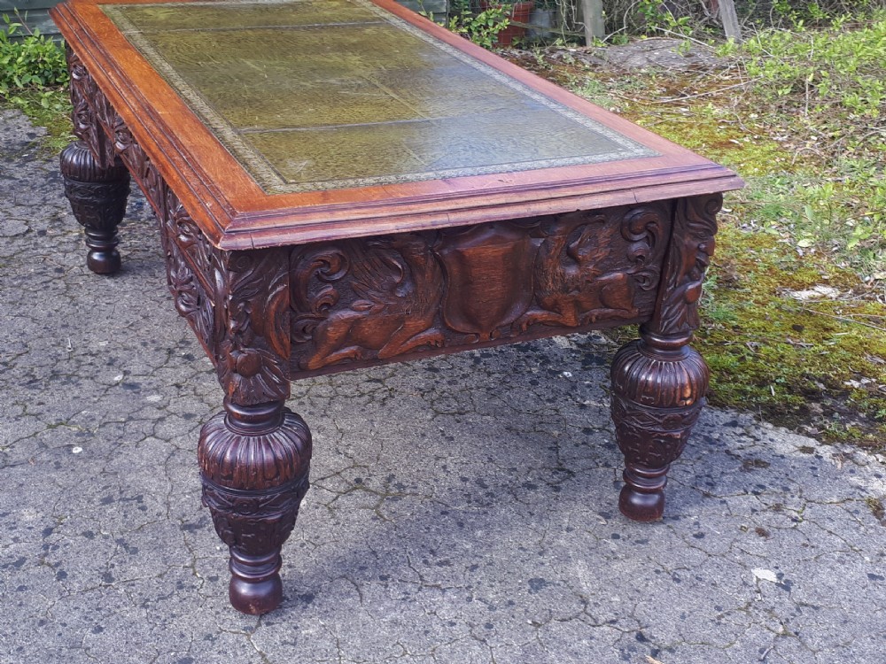 Large Victorian carved oak partners writing desk  View II